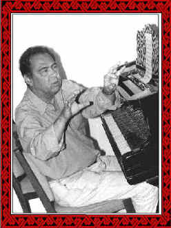 Don seated at the piano, giving a seminar at the Morelia Festival (Mex), 1996.